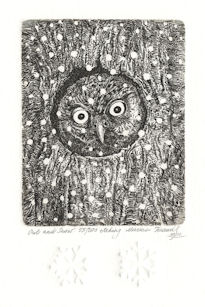 owl in tree cavity looking out at snow that is falling