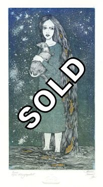 girl standing in river and holding an otter